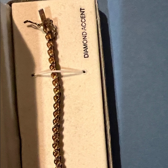 Elegant 18 K Gold over Sterling Silver Tennis Bracelet with Diamond Accents - Picture 9 of 10